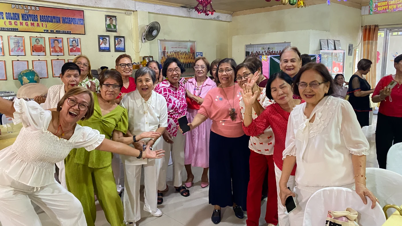 Golden Mentors members celebrating new leadership during December 2025 election ceremony