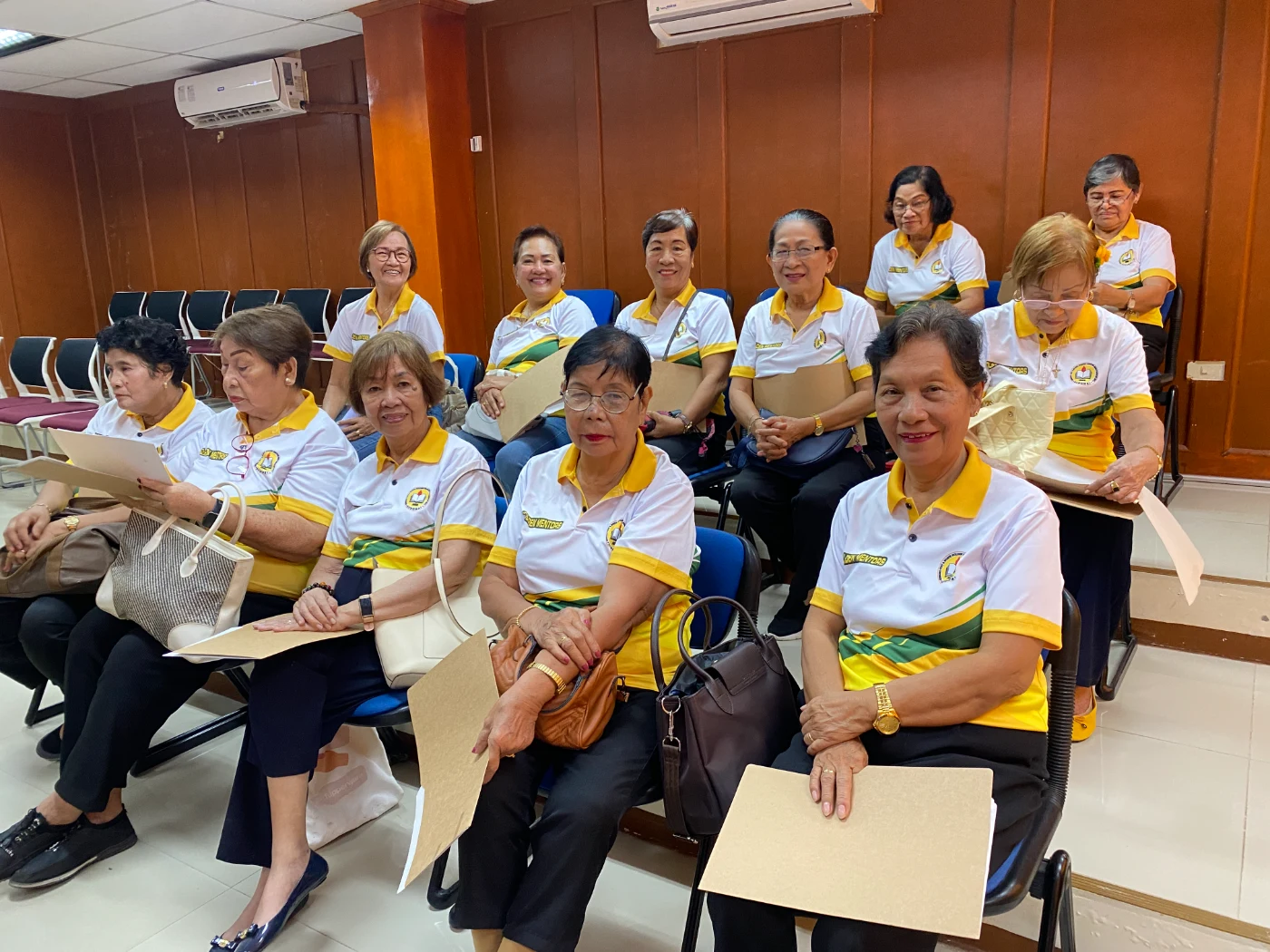 Golden Mentors members singing Christmas carols at Sangguniang Panlungsod Surigao City 2025
